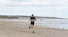 Mike Jefferies finishing the Pier to Pier Race, South Shields to Roker, Sunderland.